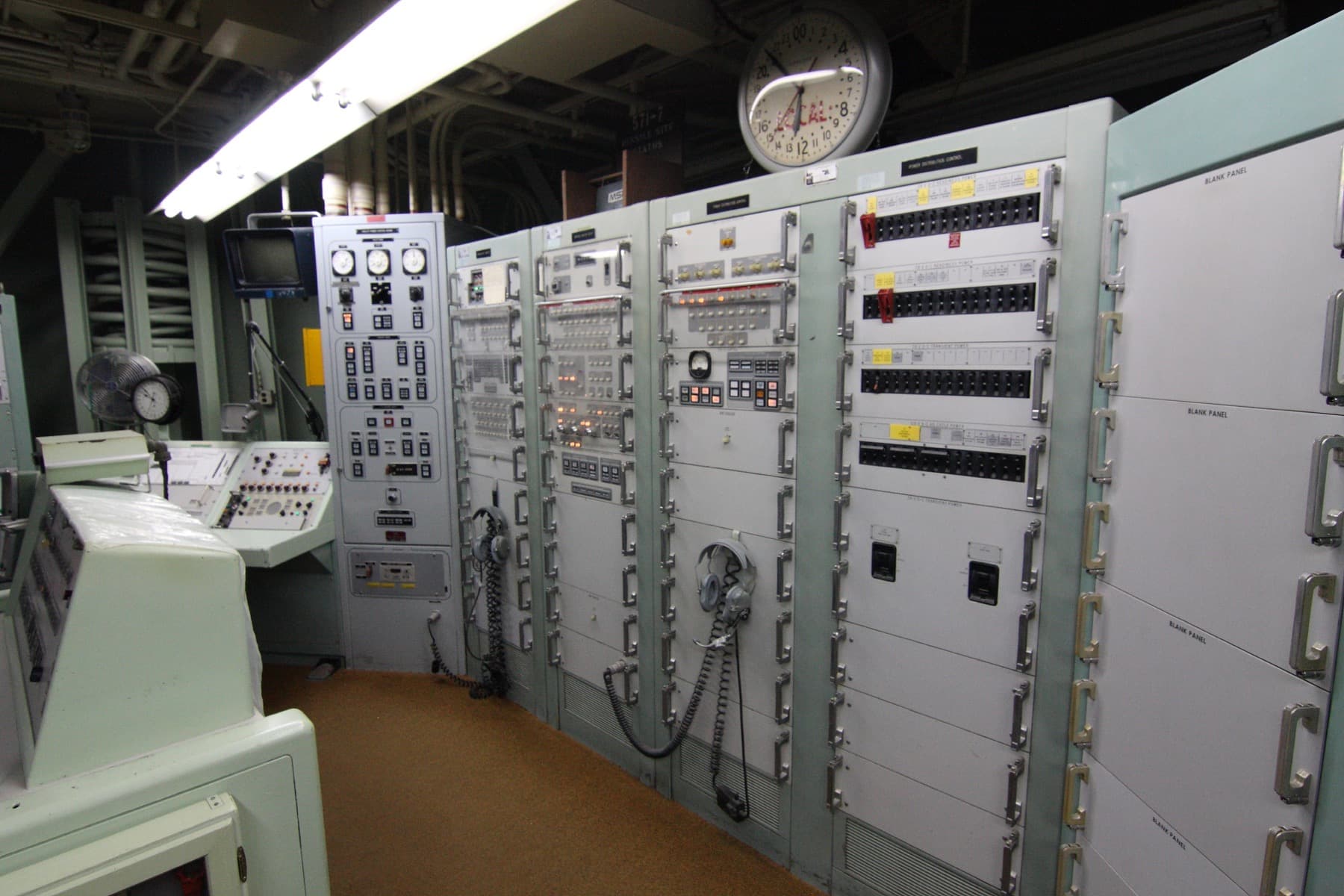 Power distribution controls and switches on a control panel